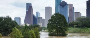 Flooded park in Houston from Hurricane Harvey with city skyline